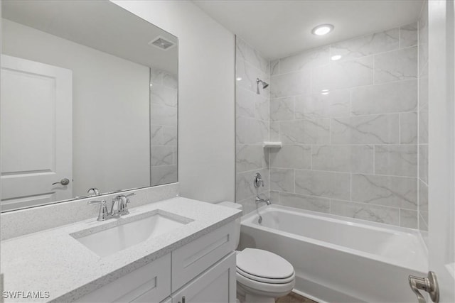 1904 NW 18th St, Cape Coral, FL 33993 - bathroom with visible vents,  shower combination, toilet, and vanity