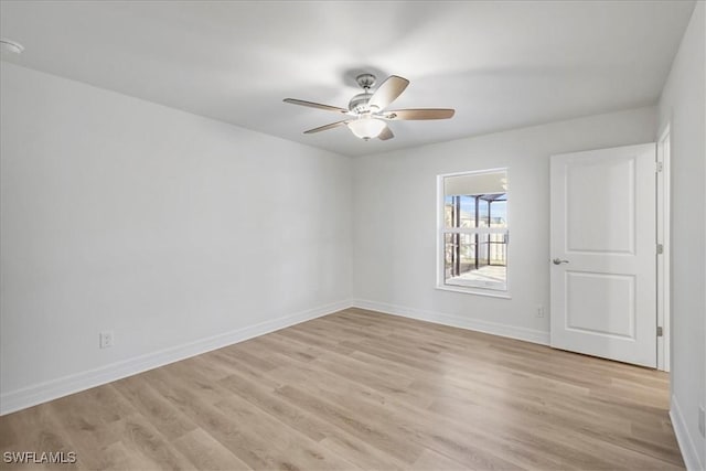 1904 NW 18th St, Cape Coral, FL 33993 - unfurnished room with a ceiling fan, baseboards, and light wood-style floors