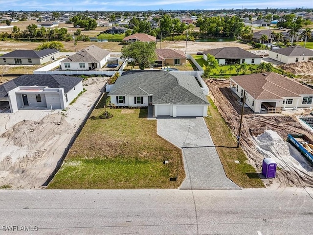 1904 NW 18th St, Cape Coral, FL 33993 - drone / aerial view with a residential view