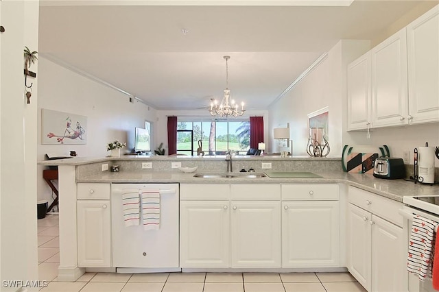 4690 Turnberry Lake Dr Unit 104, Estero, FL 33928 - kitchen with a sink, white appliances, a chandelier, a peninsula, and light tile patterned floors