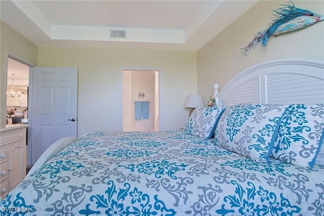 4690 Turnberry Lake Dr Unit 104, Estero, FL 33928 - bedroom with visible vents and a raised ceiling
