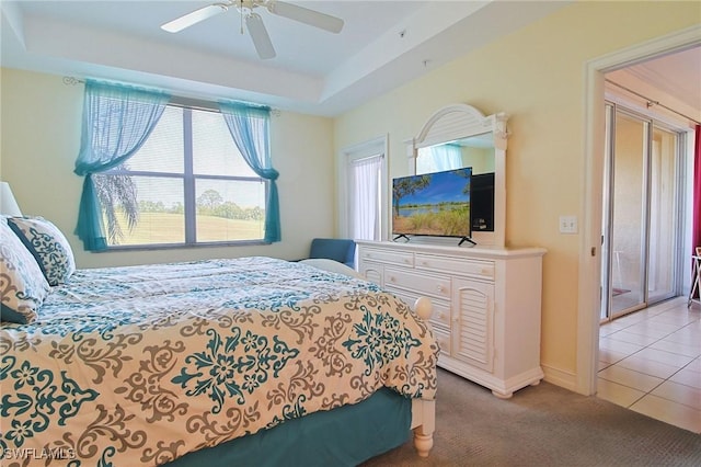 4690 Turnberry Lake Dr Unit 104, Estero, FL 33928 - bedroom with light tile patterned floors, baseboards, ceiling fan, and light carpet