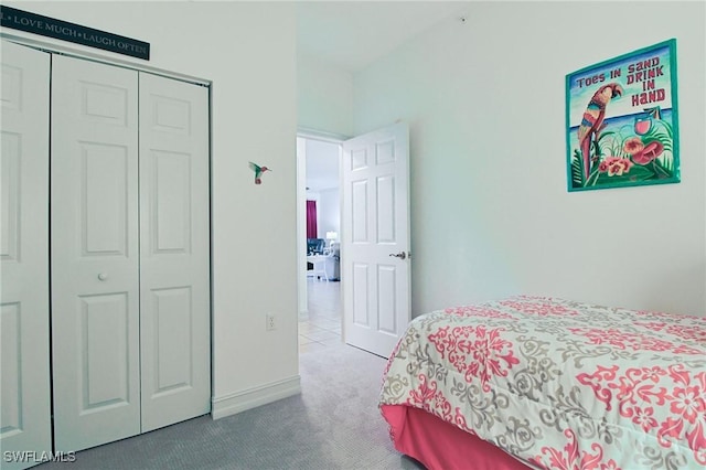 4690 Turnberry Lake Dr Unit 104, Estero, FL 33928 - carpeted bedroom with baseboards and a closet