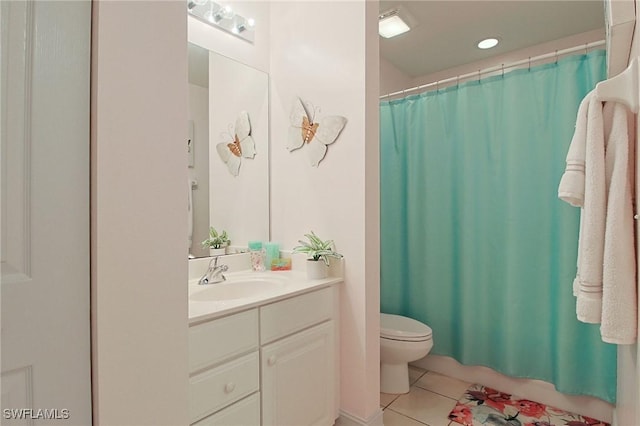 4690 Turnberry Lake Dr Unit 104, Estero, FL 33928 - bathroom featuring toilet, a shower with curtain, tile patterned flooring, and vanity
