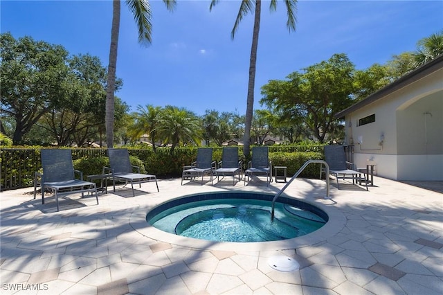 4690 Turnberry Lake Dr Unit 104, Estero, FL 33928 - view of pool featuring a hot tub and a patio area