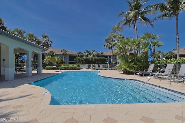 4690 Turnberry Lake Dr Unit 104, Estero, FL 33928 - community pool with a patio area