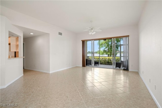 25073 Peacock Ln Unit 102, Naples, FL 34114 - unfurnished room featuring light tile patterned floors, baseboards, a ceiling fan, and recessed lighting
