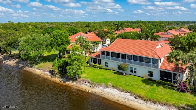 25073 Peacock Ln Unit 102, Naples, FL 34114 - view from above of property featuring a nearby body of water and a heavily wooded area