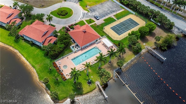 25073 Peacock Ln Unit 102, Naples, FL 34114 - aerial view of a pool area and a nearby body of water