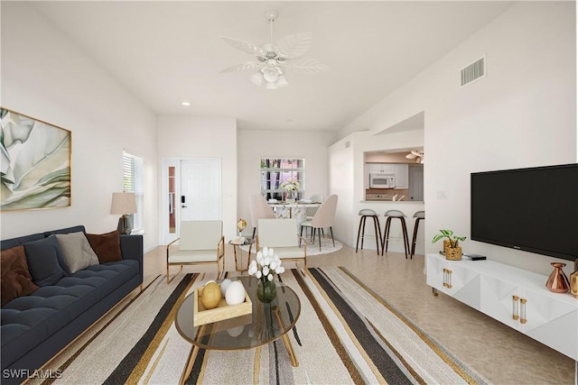 25073 Peacock Ln Unit 102, Naples, FL 34114 - living area featuring ceiling fan and recessed lighting