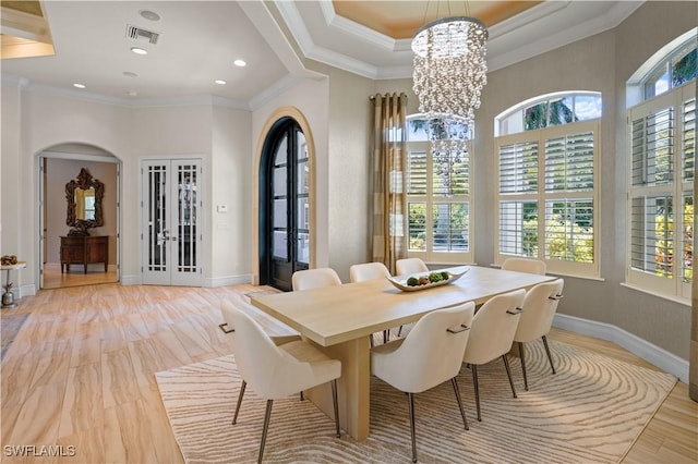 10371 Via Anacapri Ct, Miromar Lakes, FL 33913 - dining area featuring ornamental molding, a wealth of natural light, and visible vents