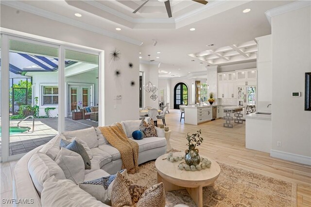10371 Via Anacapri Ct, Miromar Lakes, FL 33913 - living room featuring recessed lighting, crown molding, a ceiling fan, coffered ceiling, and light wood-style floors