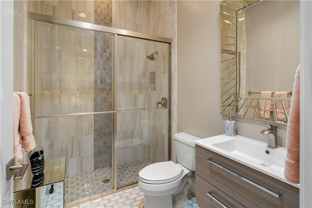 10371 Via Anacapri Ct, Miromar Lakes, FL 33913 - full bathroom with vanity, toilet, and a shower stall