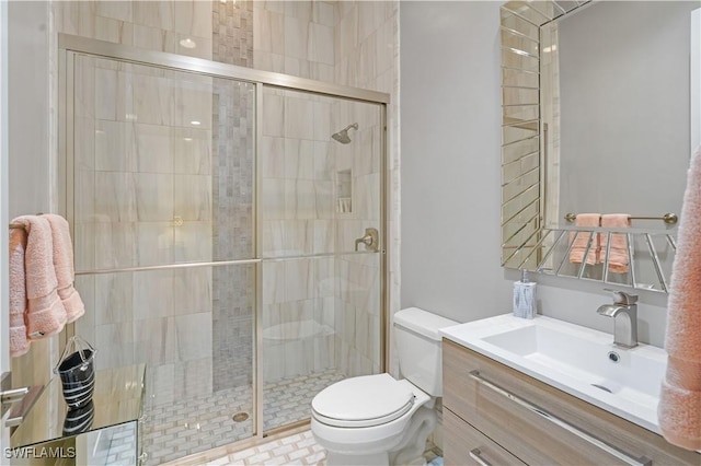 10371 Via Anacapri Ct, Miromar Lakes, FL 33913 - bathroom with vanity, toilet, and a stall shower