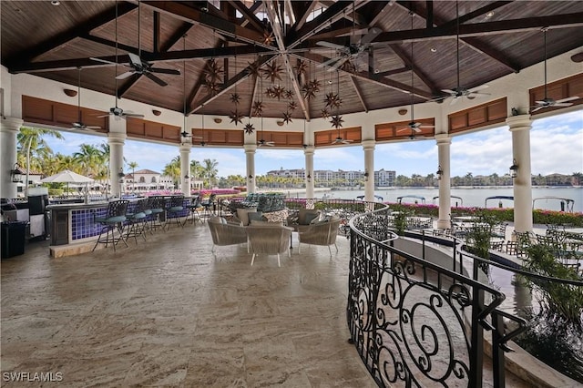 10371 Via Anacapri Ct, Miromar Lakes, FL 33913 - view of patio featuring a ceiling fan, a gazebo, and a water view