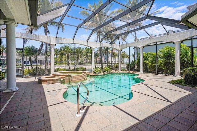 10371 Via Anacapri Ct, Miromar Lakes, FL 33913 - view of swimming pool with a patio area, a pool with connected hot tub, and a lanai