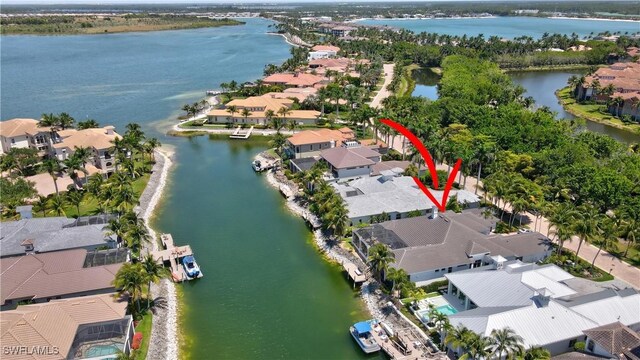 10371 Via Anacapri Ct, Miromar Lakes, FL 33913 - bird's eye view with a water view and a residential view