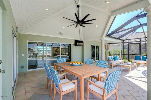 sunroom / solarium with a ceiling fan and outdoor lounge area