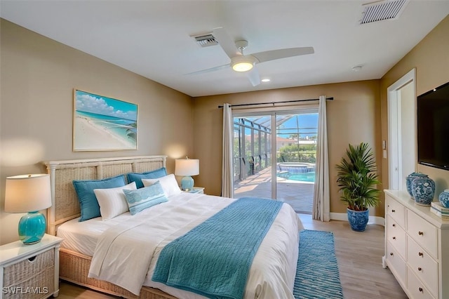 bedroom with baseboards, visible vents, light wood-type flooring, and access to exterior