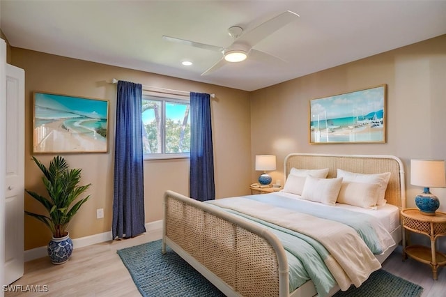 bedroom featuring recessed lighting, baseboards, ceiling fan, and light wood-type flooring