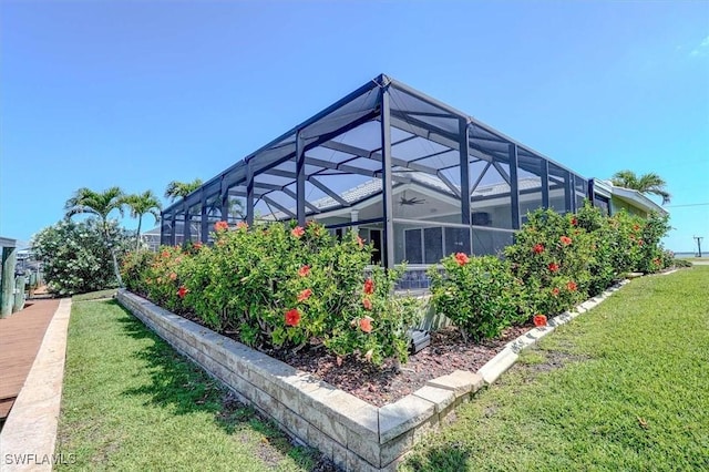view of yard featuring a lanai