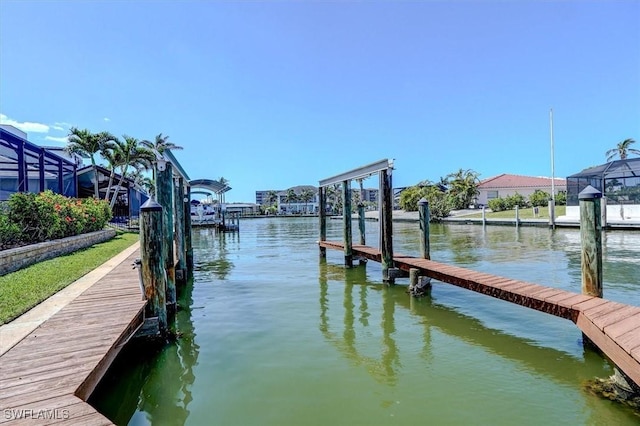 dock area with a water view