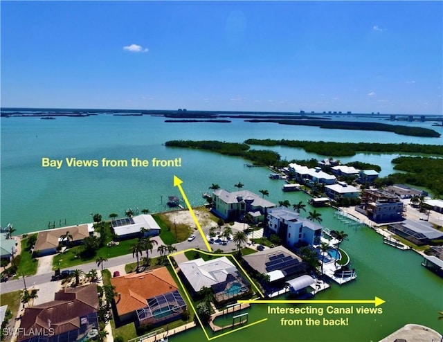 drone / aerial view featuring a water view