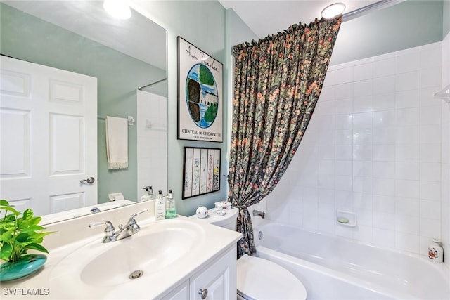 full bath featuring shower / bathtub combination, toilet, and vanity