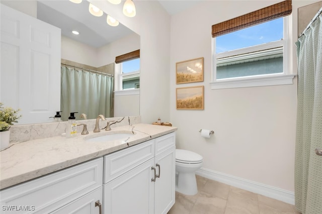 28306 Captiva Shell Loop, Bonita Springs, FL 34135 - bathroom with baseboards, a shower with curtain, toilet, and vanity