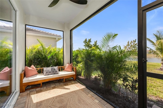 28306 Captiva Shell Loop, Bonita Springs, FL 34135 - sunroom with a water view, ceiling fan, and a wealth of natural light