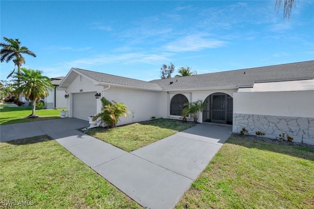 2723 SW 5th Ave, Cape Coral, FL 33914 - single story home featuring concrete driveway, stucco siding, a garage, and a front yard
