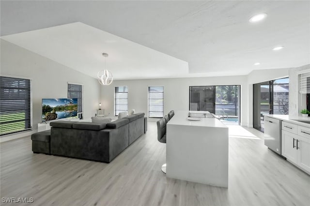 2723 SW 5th Ave, Cape Coral, FL 33914 - living area featuring light wood-style flooring, recessed lighting, and vaulted ceiling