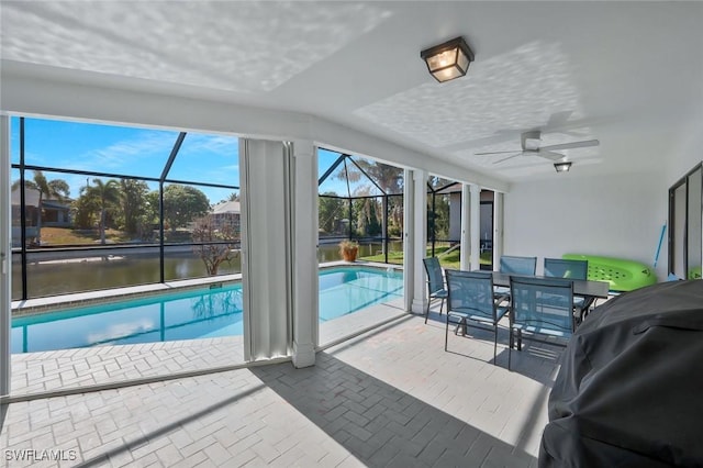 2723 SW 5th Ave, Cape Coral, FL 33914 - swimming pool with a patio, a ceiling fan, area for grilling, and a lanai