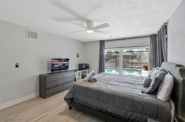 2723 SW 5th Ave, Cape Coral, FL 33914 - bedroom with light wood-style floors, baseboards, and ceiling fan