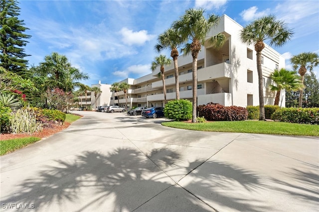 501 Forest Lakes Blvd Unit 111, Naples, FL 34105 - view of property featuring a residential view and uncovered parking