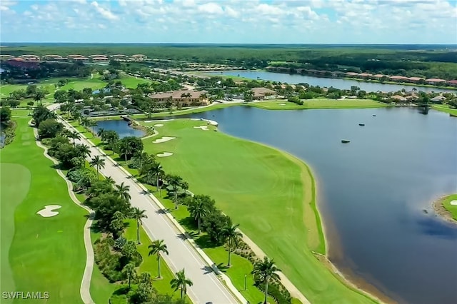 bird's eye view featuring a water view, golf course view, and a residential view