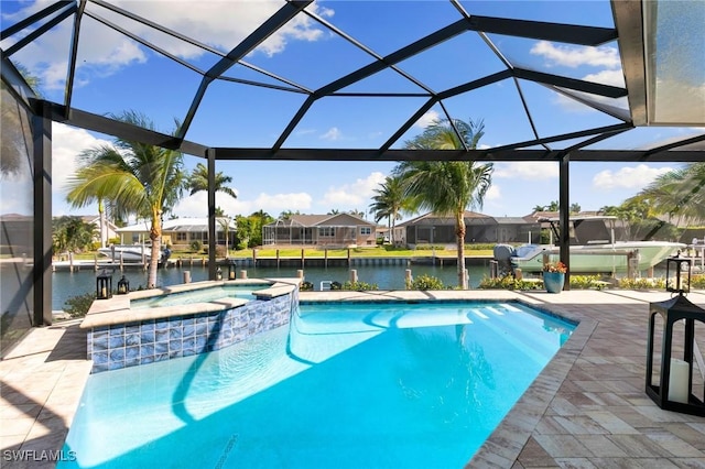 1114 Shenandoah Ct, Marco Island, FL 34145 - view of swimming pool with a residential view, a patio area, a water view, a lanai, and a pool with connected hot tub