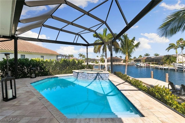 view of swimming pool with a lanai, a patio, a water view, and a pool with connected hot tub