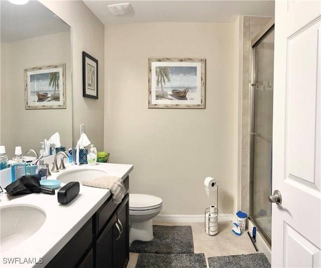 3779 Crofton Ct, Fort Myers, FL 33916 - bathroom featuring a sink, toilet, an enclosed shower, and tile patterned floors