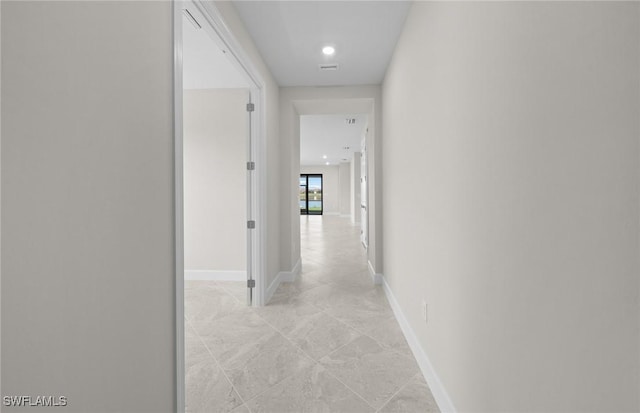 16748 Rolling Rock Blvd, Alva, FL 33920 - hall with baseboards and light marble finish floors