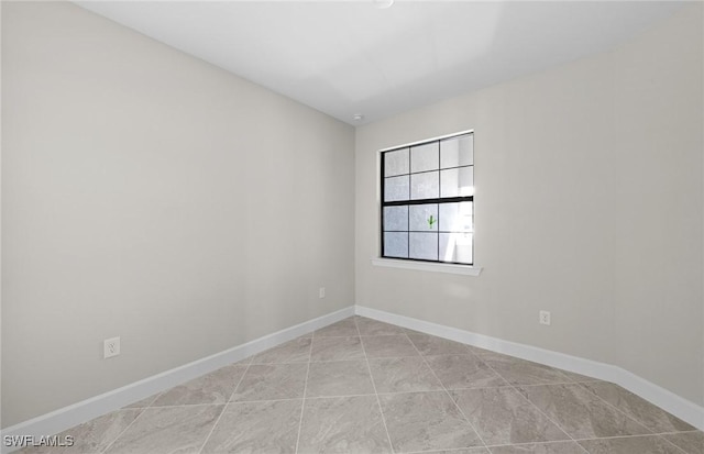 16748 Rolling Rock Blvd, Alva, FL 33920 - unfurnished room featuring baseboards and light tile patterned floors