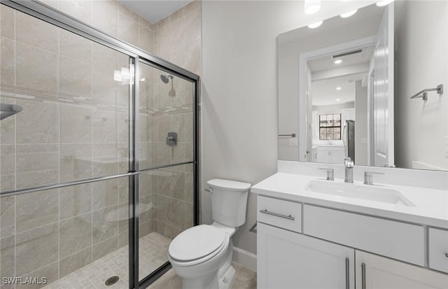16748 Rolling Rock Blvd, Alva, FL 33920 - bathroom featuring a stall shower, toilet, vanity, and baseboards