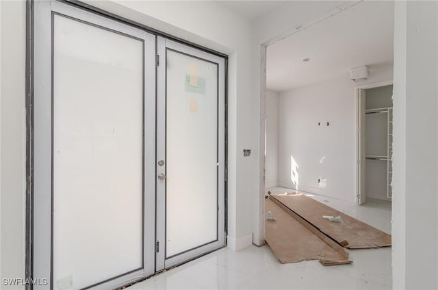 interior space with baseboards