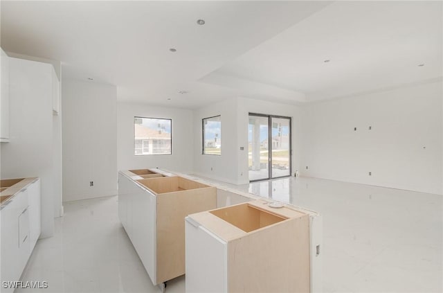 kitchen featuring white cabinetry and modern cabinets