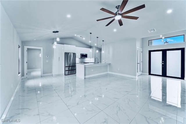 unfurnished living room with visible vents, a ceiling fan, marble finish floor, and baseboards