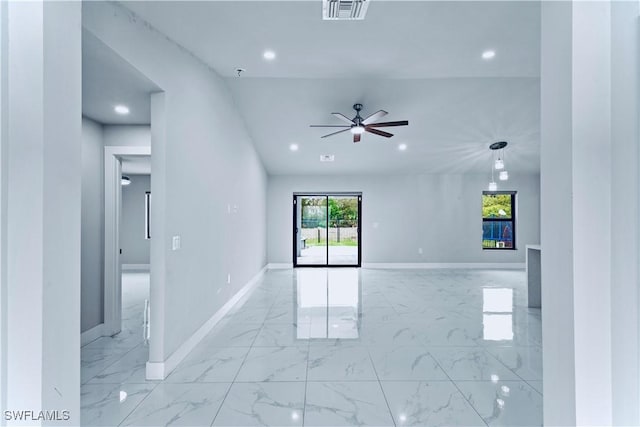 empty room with recessed lighting, baseboards, marble finish floor, and visible vents