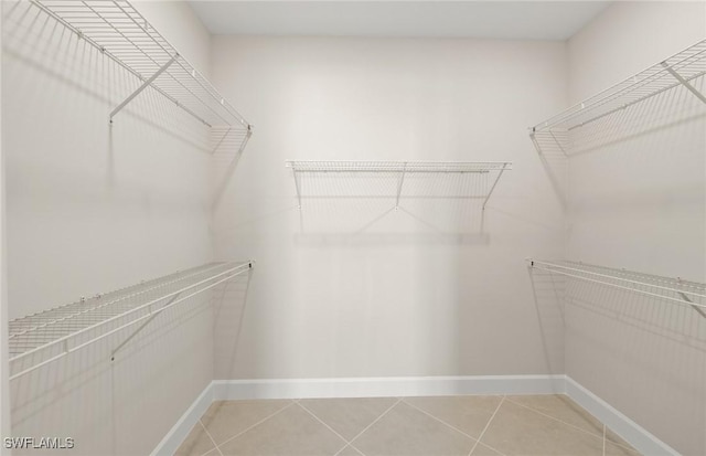 16740 Rolling Rock Blvd, Alva, FL 33920 - walk in closet with light tile patterned floors