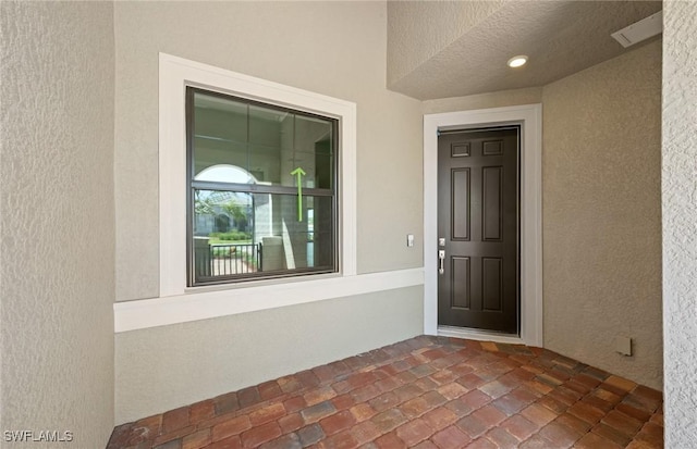 16740 Rolling Rock Blvd, Alva, FL 33920 - doorway to property featuring stucco siding