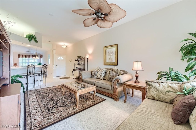 living room featuring a ceiling fan