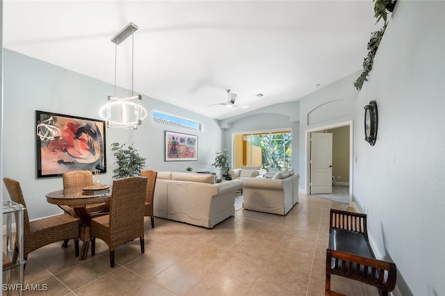 living room with ceiling fan, light tile patterned flooring, and baseboards